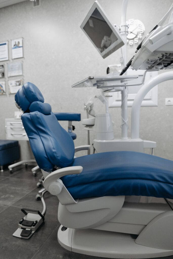Dentist consulting with patient about implant treatment plan