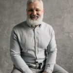 Portrait of smiling male dental implant patient